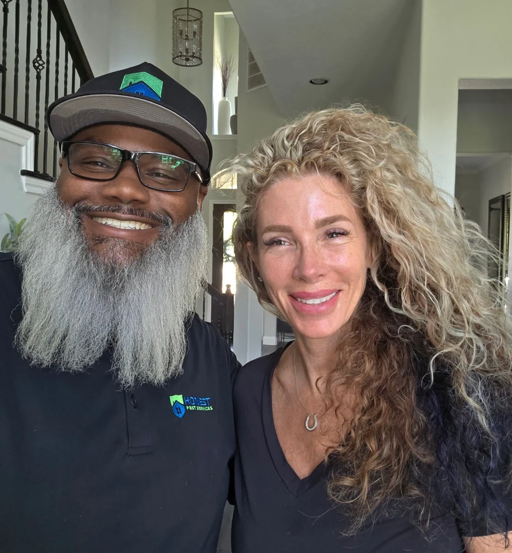 James Wyatt and a woman smiling together during a home visit